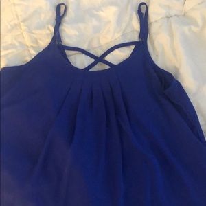 Strappy, crisscrossed back tank.